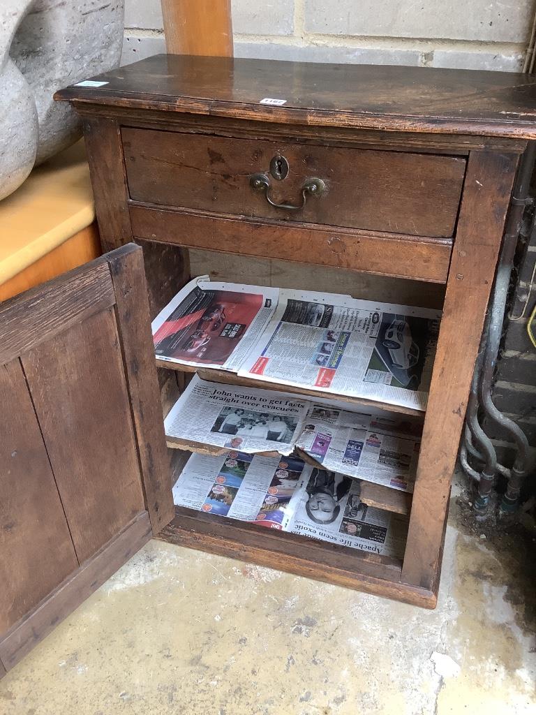 A 17th century Welsh oak single door cupboard, width 67cm, depth 32cm, height 90cm